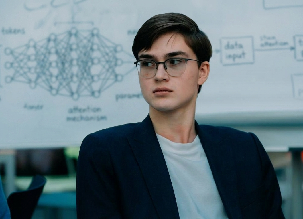 Mikhail Nedosekin at a whiteboard covered with a neural network and attention mechanism diagram